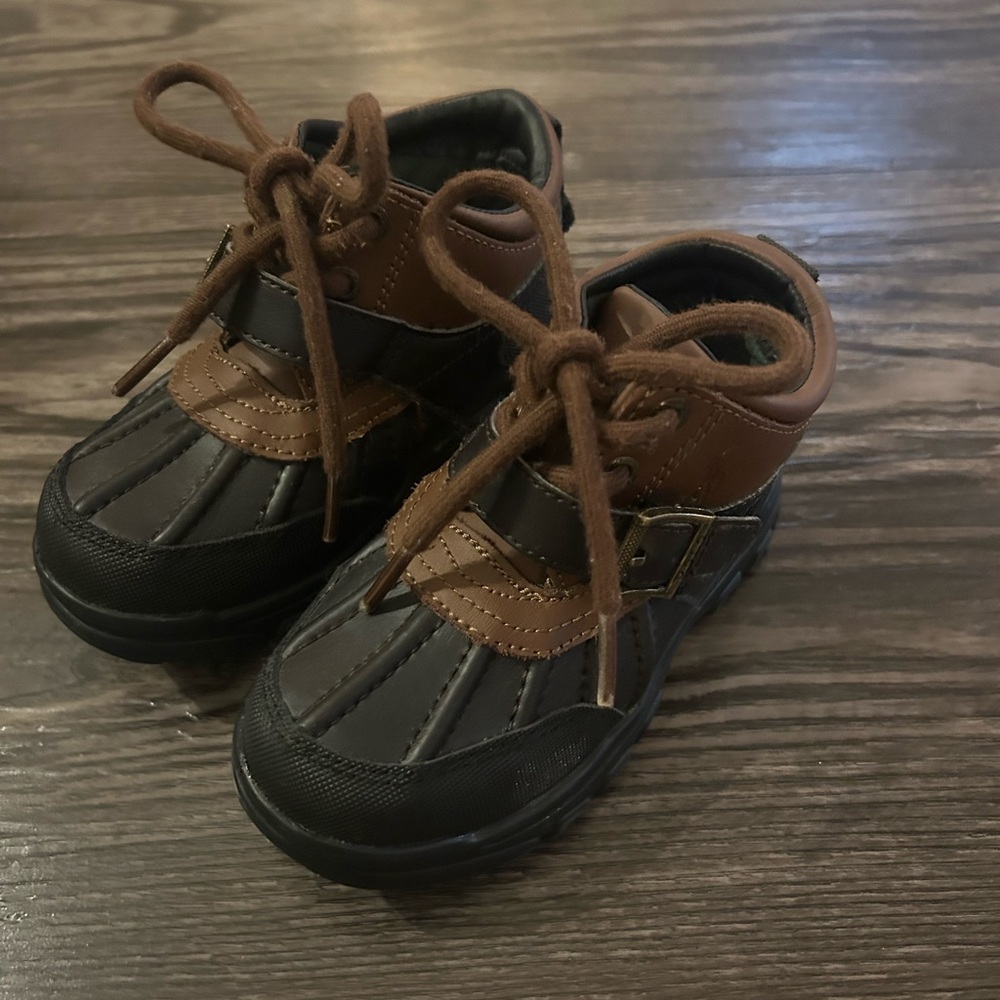 Brown and Black Boots with Rugged Design and Durable Material